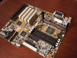 Отдается в дар «Материнская плата ASUS P2B-S.»