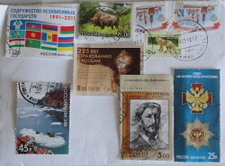 Отдается в дар «Почтовые марки и дисконтные карты»