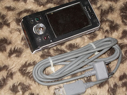 Отдается в дар «Телефон Sony Ericson w910i + USB шнур»