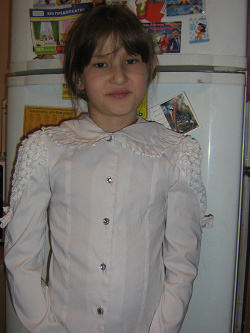 Отдается в дар «Шикарная белая блузка для девочки»