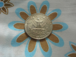 Отдается в дар «монетка 25 центов США»