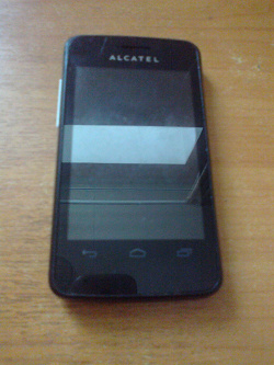 Отдается в дар «смартфон Alcatel One Touch»