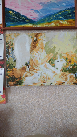 Отдается в дар «Картина Ангел с кроликом 30*40»