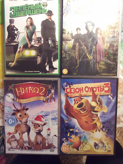 Отдается в дар «DVD с фильмами и мультфильмами»