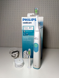Отдается в дар «Электрическая зубная щетка Philips»