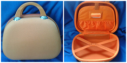 Отдается в дар «Оранжевый чемоданчик — косметичка»