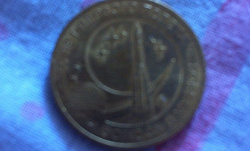 Отдается в дар «монета 10 рублей «50 лет первого полета человека в космос»»