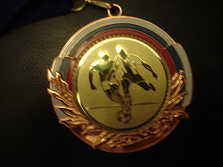 Отдается в дар «Медаль футбольная»