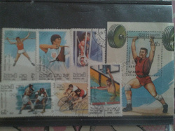 Отдается в дар «Иностранные марки и блок «Олимпиада в Барселоне».»