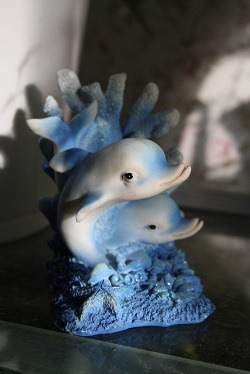 Отдается в дар «статуэтка с дельфинами»