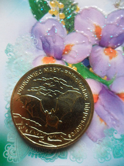 Отдается в дар «Монета Польши 2 злотых — летучая мышь (подковонос) unc»