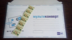 Отдается в дар «мультиконверт новый и марки»
