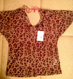 Отдается в дар «Леопардовая блузка М новая»