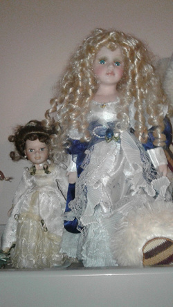 Отдается в дар «Фарфоровая кукла в свадебном платье»