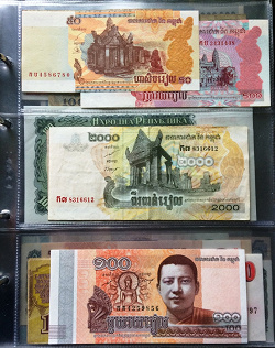 Отдается в дар «Банкноты и марка Камбоджи»