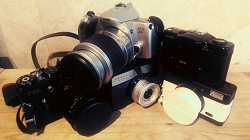 Отдается в дар «фотоаппарат пленочный Canon EOS 300v»