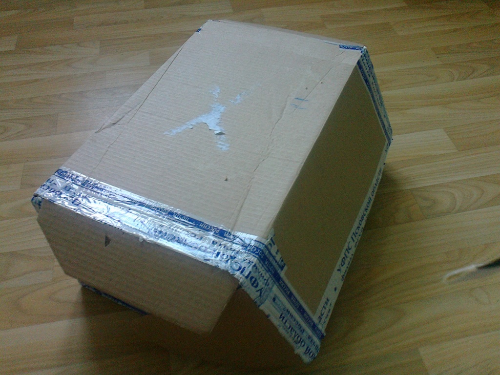 Как упаковать коробку для почты. Посылка в коробке. Упаковка посылки в ткань. Коробки для отправки посылок. Упаковка посылок в коробки.