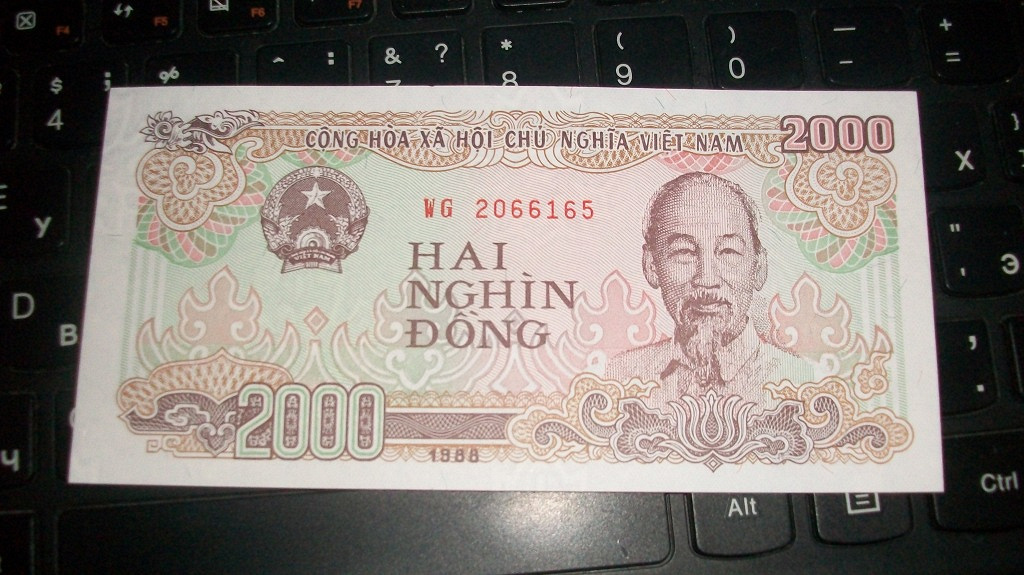 1000 рублей в юанях. Купюра Hai nghin dong. 2000 Донгов. 2000 Юаней. Купюра 2000 вьетнамских донгов.