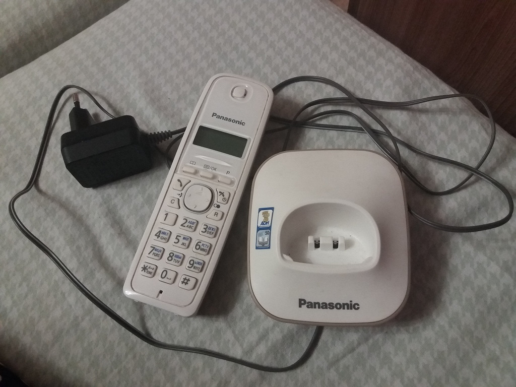 регистрация трубки panasonic pqhx11310. кнопка dial на трубке панасоник. трубка панасоник не работает. радиотелефон dect panasonic kx-tgf310rum. трубка телефона панасоник не заряжается.