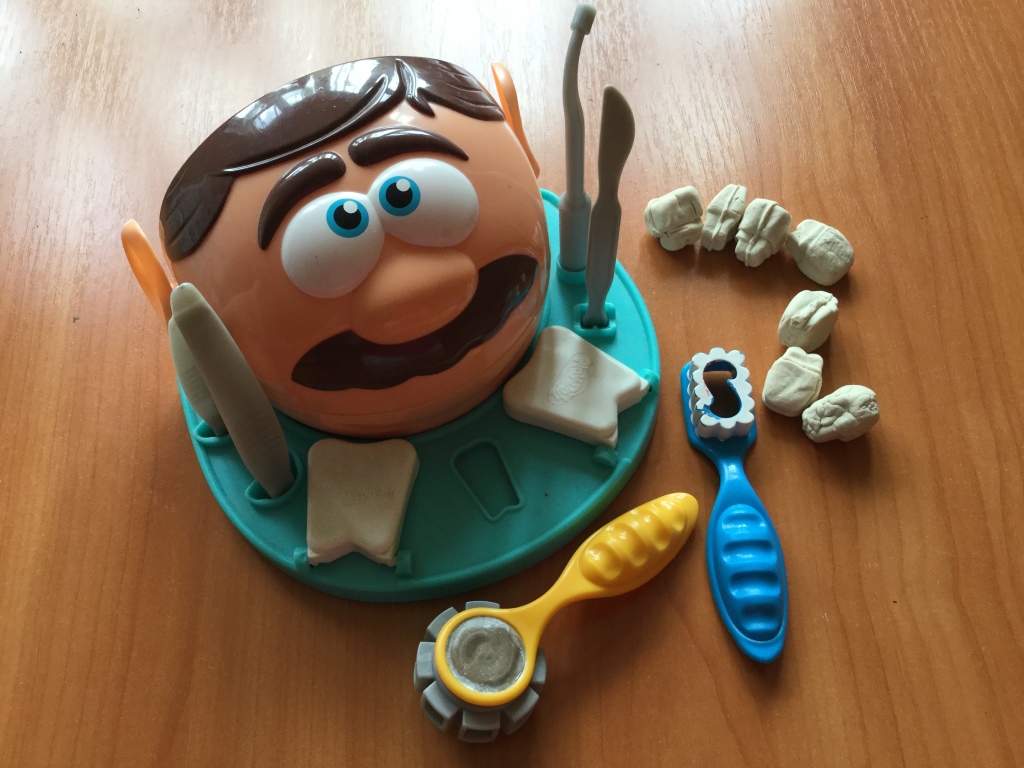 зубастик с золотыми зубами