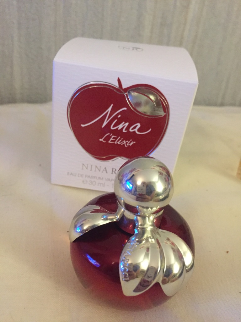 Nina elixir. Нина Ричи l'Elixir. Nina Ricci 'Nina' l'Elixir Lady Mini 4ml EDP. Нина Риччи «Nina l’Elixir 1948. Nina Ricci - Nina l'Elixir (туалетная вода + лосьон для тела)80+100.