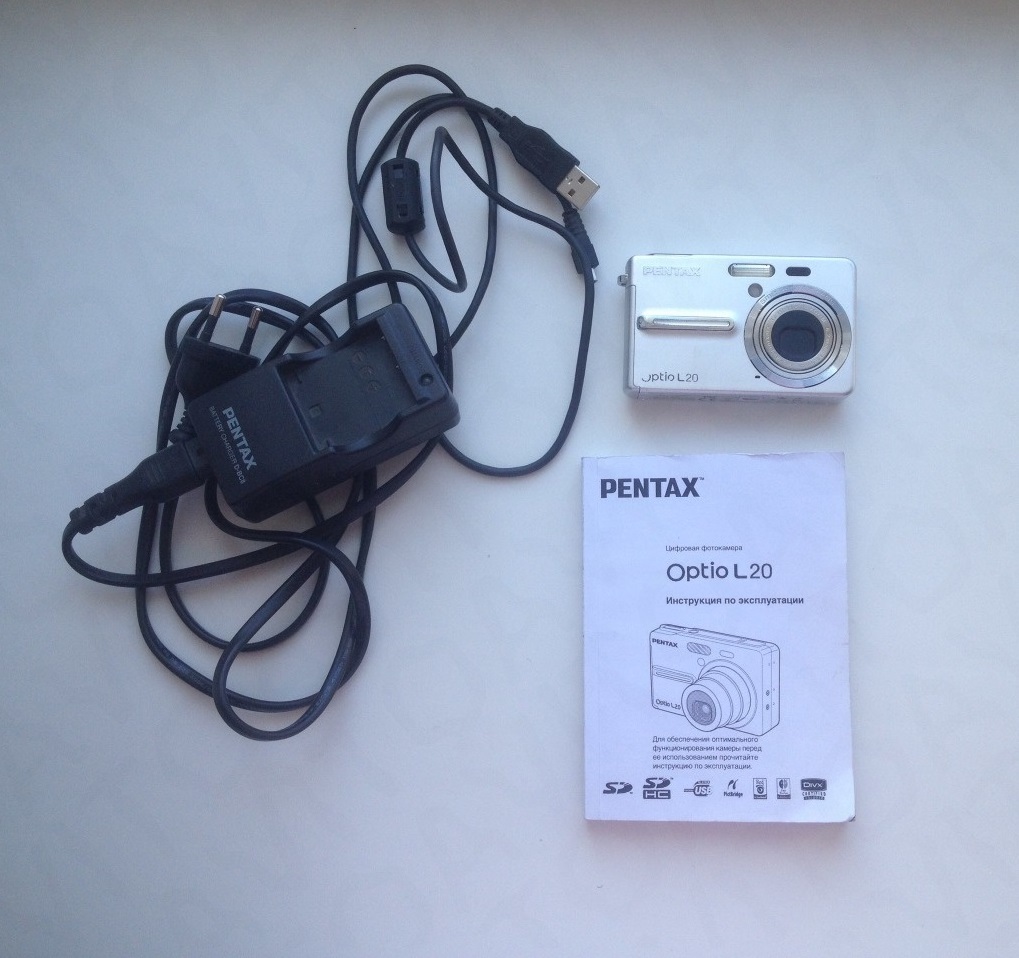 Как зарядить фотоаппарат. Pentax Optio l20. Фотоаппарат Pentax Optio l20. Pentax Optio 50l. Pentax Optio a40 шнур питания.