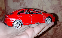 Отдается в дар Машинка железная Mitsubishi Lancer.