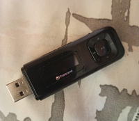 Отдается в дар USB-накопитель Transcend