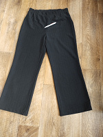 Отдается в дар чёрные брюки 50-52 р средний рост.