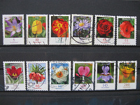 Отдается в дар Немецкие марки с цветами