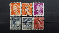 Отдается в дар Елизавета II. Стандартные марки Австралии.