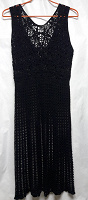 Отдается в дар Платье качественное, черного цвета, связанное на спицах 46-48 р/р