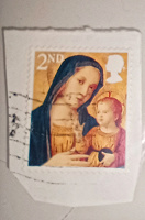 Отдается в дар Английские марки.Женщина с ребёнком
