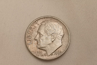Отдается в дар Монета 10 центов дайм 1962 года.