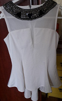 Отдается в дар белая блузка с баской 42-44р