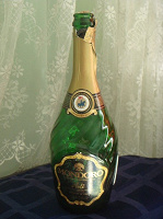 Отдается в дар бутылка из-под шампанского «Моndoro» Asti