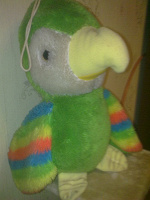 Отдается в дар Большой зеленый попугай(игрушка)…