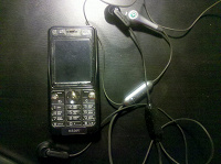 Отдается в дар Мобильный телефон Sony-Ericsson K530 + 2 Handsfree