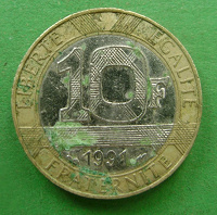 Отдается в дар монета 10 франков