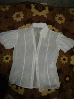Отдается в дар летняя прозрачная блузка 44-46