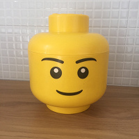 Отдается в дар Коробка в виде головы Lego