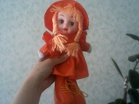 Отдается в дар кукла в оранжевом костюме на присоске