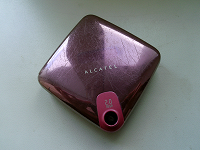 Отдается в дар Мобильный телефон Alcatel ONE TOUCH 808 (розовый)