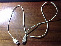 Отдается в дар USB-кабель и зарядное устройство для плеера Ритмикс 9000