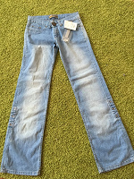 Отдается в дар Новые джинсы 42 размер