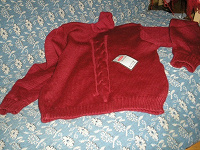 Отдается в дар Новый свитер. 46 размер