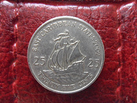 Отдается в дар Монета Восточно-Карибского государства.