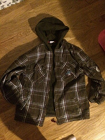 Отдается в дар теплая рубашка-куртка мальчику 146