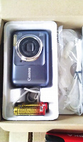 Отдается в дар простенький Canon, новый