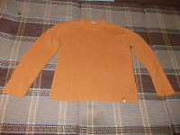 Отдается в дар Оранжевый свитер.